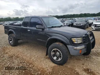 2000 Toyota Tacoma PreRunner with VIN 4TASM92N5YZ656353, listed as a Copart auction lot 60295275 with 281,573 mi miles and Clean title. Bid and sale history available at DreamBid. Image 4.