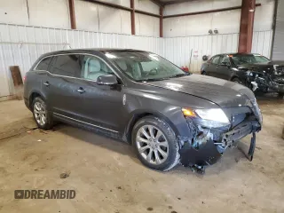 2014 Lincoln MKT EcoBoost with VIN 2LMHJ5AT0EBL51745, listed as a Copart auction lot 50656255 with 121,165 mi miles and Clean Title. Bid and sale history available at carsss.com. Image 4.
