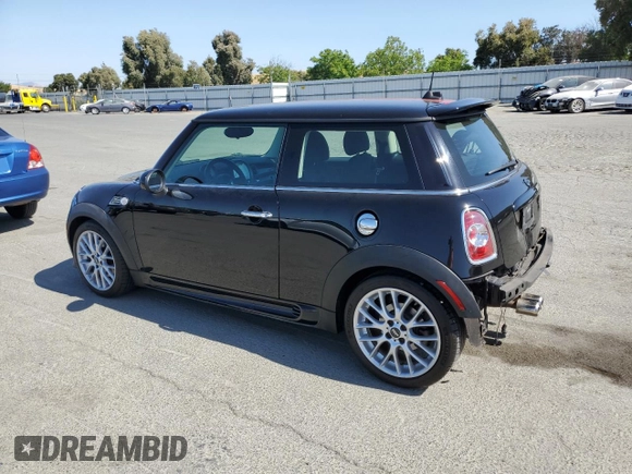 2011 MINI Hardtop S with VIN WMWSV3C57BTY16043, listed as a Copart auction lot 59337575 with 84,617 mi miles and Salvage title. Bid and sale history available at DreamBid. Image 2.