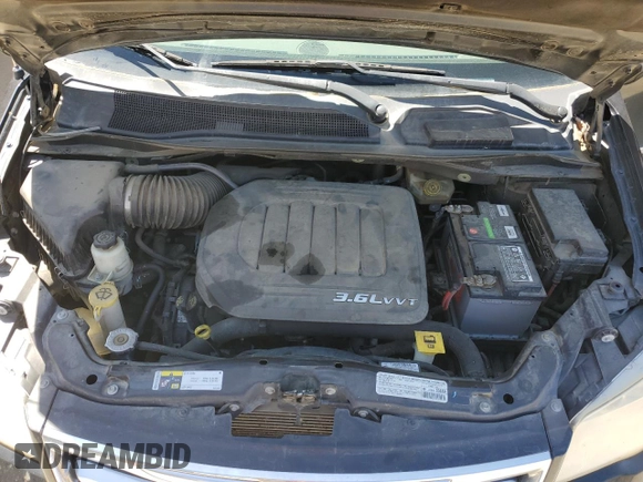 2014 Chrysler Town & Country Touring z VIN 2C4RC1BGXER144103, wystawiony jako Copart lot #54843175 z przebiegiem 113 166 mil mil oraz Szkoda całkowita • Salvage title. Historia ofert i sprzedaży dostępna na DreamBid. Obrazek 12.