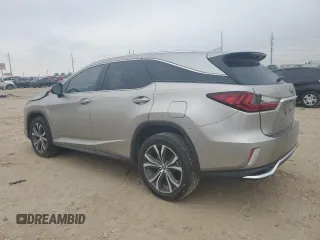 2021 Lexus RX 350L with VIN JTJHZKEA3M2022121, listed as a Copart auction lot 83263024 with 39,684 mi miles and Salvage title. Bid and sale history available at DreamBid. Image 2.