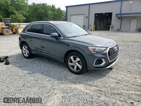 2020 Audi Q3 Premium z VIN WA1AECF33L1008711, wystawiony jako Copart lot #53907995 z przebiegiem 64 411 mil mil oraz Szkoda całkowita • Salvage title. Historia ofert i sprzedaży dostępna na DreamBid. Obrazek 14.