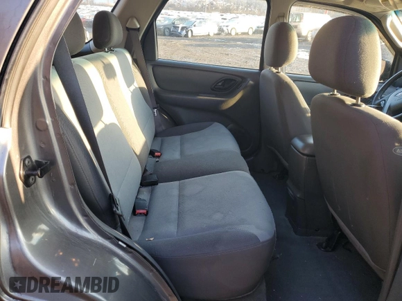 2004 Ford Escape XLS with VIN 1FMCU92134KB88319, listed as a Copart auction lot 84243494 with 158,052 mi miles and Salvage Title. Bid and sale history available at DreamBid. Image 12.