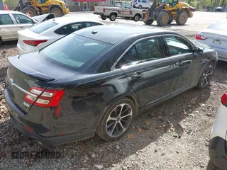 2014 Ford Taurus SHO with VIN 1FAHP2KT8EG131067, listed as a IAAI auction lot 42102086 with 107,822 mi miles. Bid and sale history available at carsss.com. Image 4.