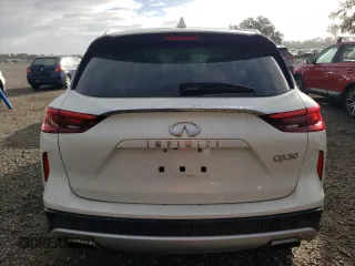2020 Infiniti QX50 Luxe z VIN 3PCAJ5M13LF109821, wystawiony jako Copart lot #55364455 z przebiegiem 49 237 mil mil oraz Nie do naprawy • Non repairable. Historia ofert i sprzedaży dostępna na DreamBid. Obrazek 6.