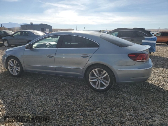 2013 Volkswagen CC Lux with VIN WVWRP7AN5DE525411, listed as a Copart auction lot 77148844 with 117,652 mi miles and Salvage Title. Bid and sale history available at DreamBid. Image 2.