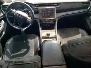 2023 Jeep Grand Cherokee Altitude z VIN 1C4RJHAG8P8883047, wystawiony jako Copart lot #49694315 z przebiegiem 19 156 mil mil oraz Szkoda całkowita • Salvage title. Historia ofert i sprzedaży dostępna na DreamBid. Obrazek 8.