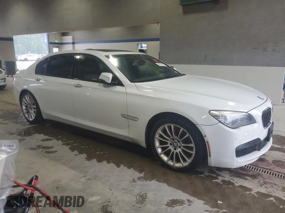 2014 BMW 7 Series ALPINA B7 xDrive with VIN WBAYF8C55ED142137, listed as a Copart auction lot 58751915 with 133,451 mi miles and Clean title. Bid and sale history available at DreamBid. Image 4.