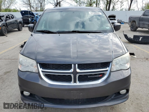 2014 Dodge Grand Caravan SXT 30th Anniversary with VIN 2C4RDGCG4ER285294, listed as a Copart auction lot 52109205 with 196,331 mi miles and Salvage Title. Bid and sale history available at DreamBid. Image 5.