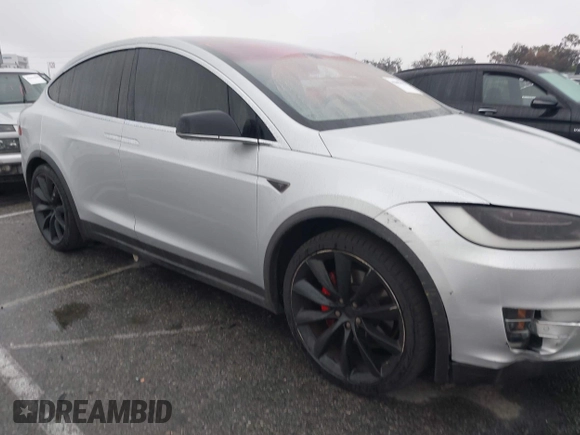 2016 Tesla Model X P90D with VIN 5YJXCBE41GF006284, listed as a IAAI auction lot 41809683 with 71,135 mi miles. Bid and sale history available at carsss.com. Image 13.