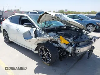 2016 Nissan Maxima SV z VIN 1N4AA6AP3GC900678, wystawiony jako IAAI lot #41837485 z przebiegiem 77 930 mil mil oraz . Historia ofert i sprzedaży dostępna na DreamBid. Obrazek 1.