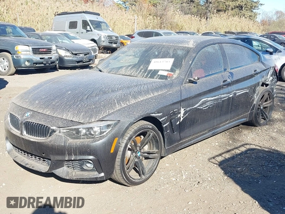 2019 BMW 4 Series 440i xDrive with VIN WBA4J7C52KBM75345, listed as a IAAI auction lot 40613703 with 31,402 mi miles and . Bid and sale history available at carsss.com. Image 18.