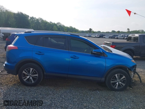 2018 Toyota RAV4 XLE with VIN JTMWFREV3JJ725847, listed as a IAAI auction lot 42110555 with 84,503 mi miles and . Bid and sale history available at DreamBid. Image 14.