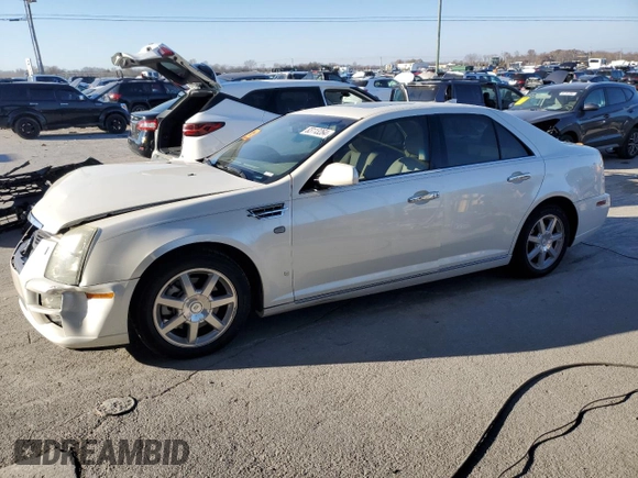 2010 Cadillac STS AWD z VIN 1G6DU6EV0A0101850, wystawiony jako Copart lot #83113264 z przebiegiem 103 491 mil mil oraz Szkoda całkowita • Salvage title. Historia ofert i sprzedaży dostępna na DreamBid. Obrazek 1.