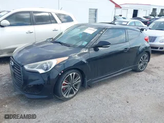 2016 Hyundai Veloster Turbo with VIN KMHTC6AE1GU271374, listed as a IAAI auction lot 41924768 with 93,072 mi miles. Bid and sale history available at carsss.com. Image 2.