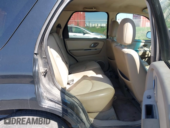2006 Mercury Mariner Luxury with VIN 4M2YU56186DJ00220, listed as a IAAI auction lot 42174056 with 208,820 mi miles and . Bid and sale history available at DreamBid. Image 8.