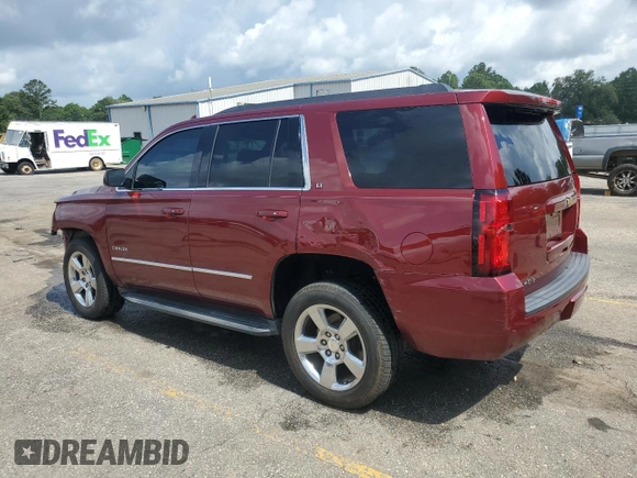 2016 Chevrolet Tahoe LT with VIN 1GNSCBKC2GR264384, listed as a Copart auction lot 60253235 with 184,796 mi miles and Salvage title. Bid and sale history available at DreamBid. Image 2.