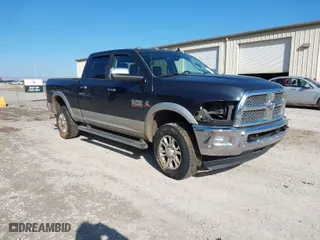 2016 Ram 2500 Laramie with VIN 3C6UR5FL3GG124072, listed as a IAAI auction lot 41305989 with 151,283 mi miles. Bid and sale history available at carsss.com. Image 1.