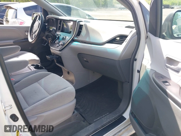 2017 Toyota Sienna LE Auto Access Seat with VIN 5TDKZ3DC7HS896262, listed as a IAAI auction lot 42147163 with 98,219 mi miles and . Bid and sale history available at DreamBid. Image 5.