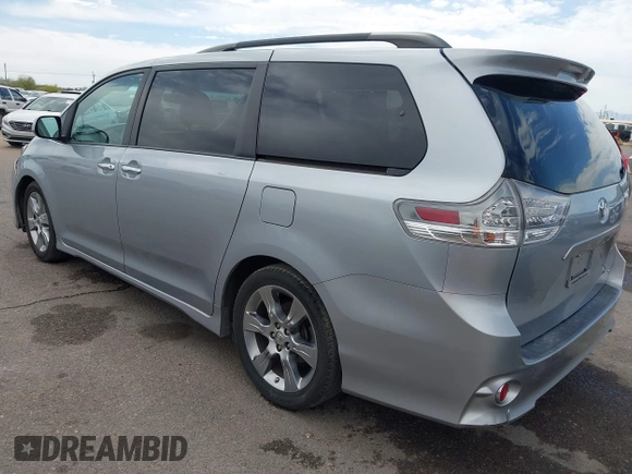 2014 Toyota Sienna SE with VIN 5TDXK3DC4ES491269, listed as a IAAI auction lot 42004485 with 118,516 mi miles and . Bid and sale history available at DreamBid. Image 3.