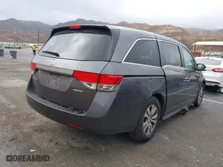 2016 Honda Odyssey SE with VIN 5FNRL5H30GB034980, listed as a IAAI auction lot 41512117 with 97,644 mi miles. Bid and sale history available at carsss.com. Image 4.