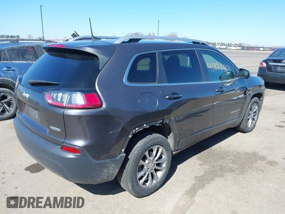 2019 Jeep Cherokee Latitude Plus with VIN 1C4PJLLB1KD201847, listed as a IAAI auction lot 41814463 with 115,927 mi miles. Bid and sale history available at carsss.com. Image 4.