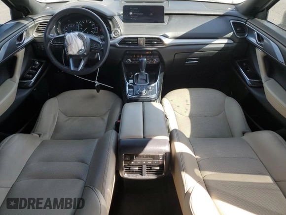 2021 Mazda CX-9 Carbon Edition с VIN JM3TCADY4M0500010, выставлен на аукционе Copart как лот 53283005 с пробегом 55 762 миль миль и Списание • Salvage title. История ставок и продаж доступна на DreamBid. Изображение 8.
