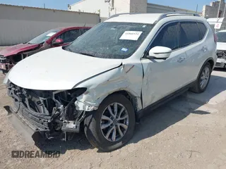 2018 Nissan Rogue SV with VIN 5N1AT2MT2JC702411, listed as a IAAI auction lot 41860534 with 87,997 mi miles and . Bid and sale history available at carsss.com. Image 2.