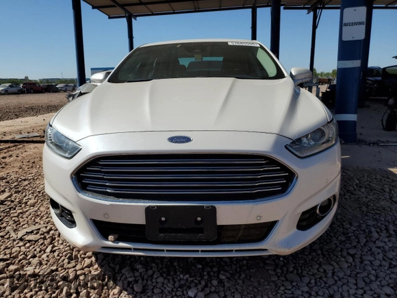 2013 Ford Fusion Titanium Hybrid z VIN 3FA6P0RUXDR376633, wystawiony jako Copart lot #57685555 z przebiegiem 133 248 mil mil oraz Szkoda całkowita • Salvage title. Historia ofert i sprzedaży dostępna na DreamBid. Obrazek 5.