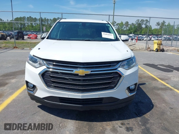 2019 Chevrolet Traverse LT z VIN 1GNERHKW2KJ305953, wystawiony jako IAAI lot #42064913 z przebiegiem 104 200 mil mil oraz . Historia ofert i sprzedaży dostępna na DreamBid. Obrazek 12.