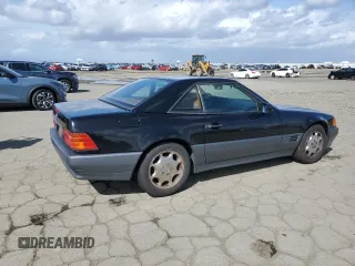 1994 Mercedes-Benz SL with VIN WDBFA63E1RF100599, listed as a Copart auction lot 51619785 with 111,720 mi miles and Clean title. Bid and sale history available at DreamBid. Image 3.