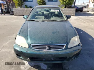 1999 Honda Civic EX z VIN 2HGEJ8647XH528203, wystawiony jako Copart lot #57507315 z przebiegiem 185 450 mil mil oraz Szkoda całkowita • Salvage title. Historia ofert i sprzedaży dostępna na DreamBid. Obrazek 5.