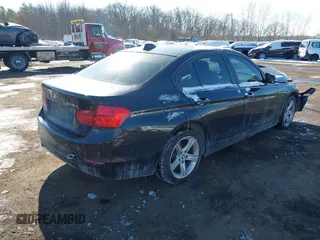 2014 BMW 3 Series 328d xDrive with VIN WBA3D5C57EKX98964, listed as a IAAI auction lot 41395268 with 135,272 mi miles. Bid and sale history available at carsss.com. Image 4.