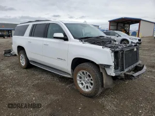 2018 GMC Yukon XL SLT with VIN 1GKS2GKC3JR357712, listed as a Copart auction lot 79893874 with 140,820 mi miles and Salvage Title. Bid and sale history available at carsss.com. Image 4.