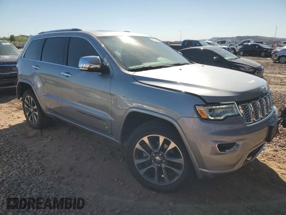 2018 Jeep Grand Cherokee Overland with VIN 1C4RJFCG8JC418368, listed as a Copart auction lot 50014005 with 34,287 mi miles and Salvage Title. Bid and sale history available at carsss.com. Image 4.