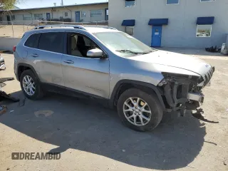 2016 Jeep Cherokee Latitude with VIN 1C4PJMCS9GW215870, listed as a Copart auction lot 57992675 with 212,594 mi miles and Salvage title. Bid and sale history available at DreamBid. Image 4.