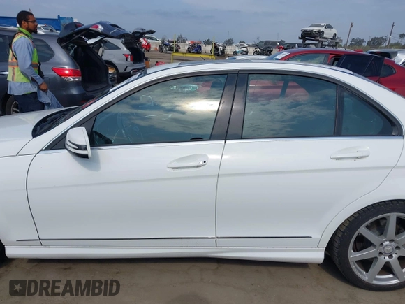 2014 Mercedes-Benz C 250 Sport with VIN WDDGF4HB5EG245388, listed as a IAAI auction lot 42407602 with 96,415 mi miles and . Bid and sale history available at DreamBid. Image 15.
