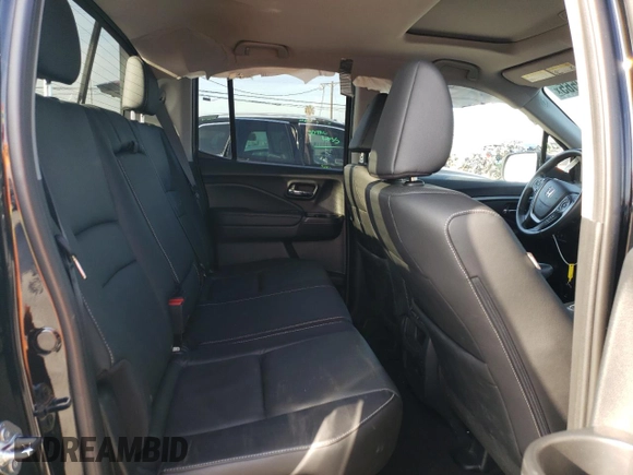 2023 Honda Ridgeline RTL with VIN 5FPYK3F52PB023574, listed as a Copart auction lot 44419565 with 15,205 mi miles and Salvage title. Bid and sale history available at DreamBid. Image 10.