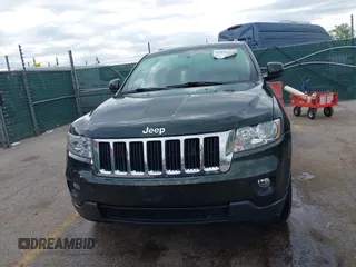 2011 Jeep Grand Cherokee 70th Anniversary with VIN 1J4RR4GG3BC631831, listed as a IAAI auction lot 42038415 with 130,811 mi miles. Bid and sale history available at carsss.com. Image 12.