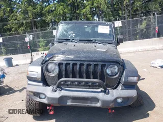 2018 Jeep Wrangler Unlimited Sport S with VIN 1C4HJXDN1JW216825, listed as a IAAI auction lot 42405799 with 37,194 mi miles and . Bid and sale history available at DreamBid. Image 12.