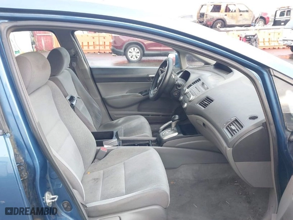 2010 Honda Civic Sdn LX with VIN 19XFA1F53AE043207, listed as a IAAI auction lot 41618430 with 122,421 mi miles. Bid and sale history available at carsss.com. Image 5.