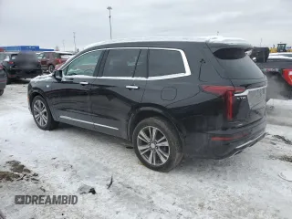 2021 Cadillac XT6 Premium Luxury with VIN 1GYKPDRS3MZ165049, listed as a Copart auction lot 45456145 with 57,112 mi miles and Salvage title. Bid and sale history available at DreamBid. Image 2.