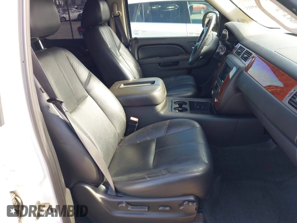 2011 Chevrolet Tahoe LT with VIN 1GNSCBE0XBR374156, listed as a IAAI auction lot 42659337 with 201,514 mi miles and . Bid and sale history available at DreamBid. Image 5.