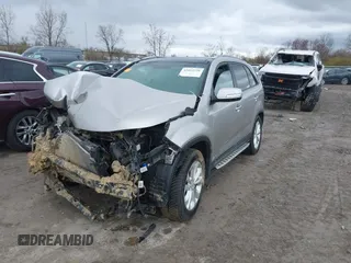 2014 Kia Sorento EX with VIN 5XYKUDA71EG456929, listed as a IAAI auction lot 42012720 with 128,557 mi miles. Bid and sale history available at carsss.com. Image 2.