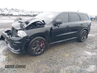 2021 Dodge Durango SRT Hellcat with VIN 1C4SDJH95MC643177, listed as a IAAI auction lot 41007139 with 31,650 mi miles and . Bid and sale history available at DreamBid. Image 2.