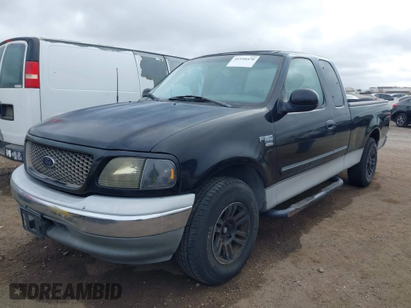 2002 Ford F-150 XL with VIN 1FTRX17W92NC06992, listed as a IAAI auction lot 41194470 with 253,923 mi miles. Bid and sale history available at carsss.com. Image 6.
