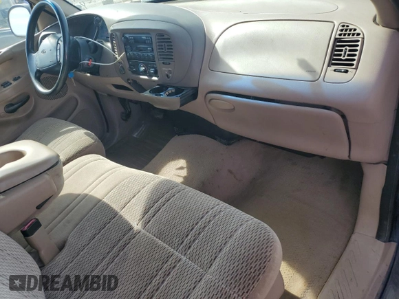 1998 Ford F-150 с VIN 1FTZX18W5WKB98492, выставлен на аукционе Copart как лот 73586864 с пробегом 174 316 миль миль и Списание • Salvage title. История ставок и продаж доступна на DreamBid. Изображение 8.