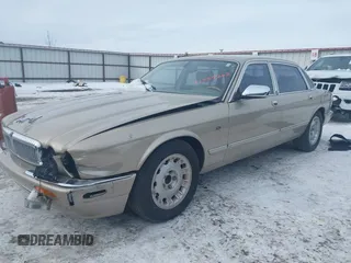 2000 Jaguar XJ Vanden Plas with VIN SAJDA24C7YLF13906, listed as a IAAI auction lot 41559262 with 122,586 mi miles and . Bid and sale history available at DreamBid. Image 2.