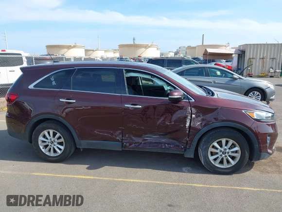 2019 Kia Sorento LX z VIN 5XYPG4A58KG565461, wystawiony jako IAAI lot #42099618 z przebiegiem 42 574 mil mil oraz . Historia ofert i sprzedaży dostępna na DreamBid. Obrazek 13.