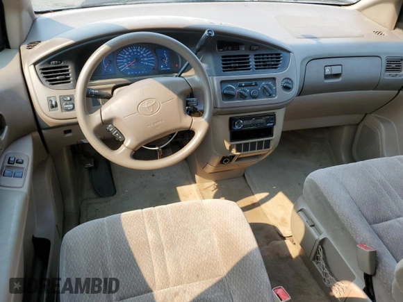 2001 Toyota Sienna CE with VIN 4T3ZF19C11U412899, listed as a Copart auction lot 70303244 with 190,025 mi miles and Salvage Title. Bid and sale history available at DreamBid. Image 8.